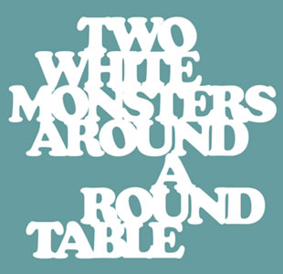 Reedição de Two White Monsters Around a Round Table